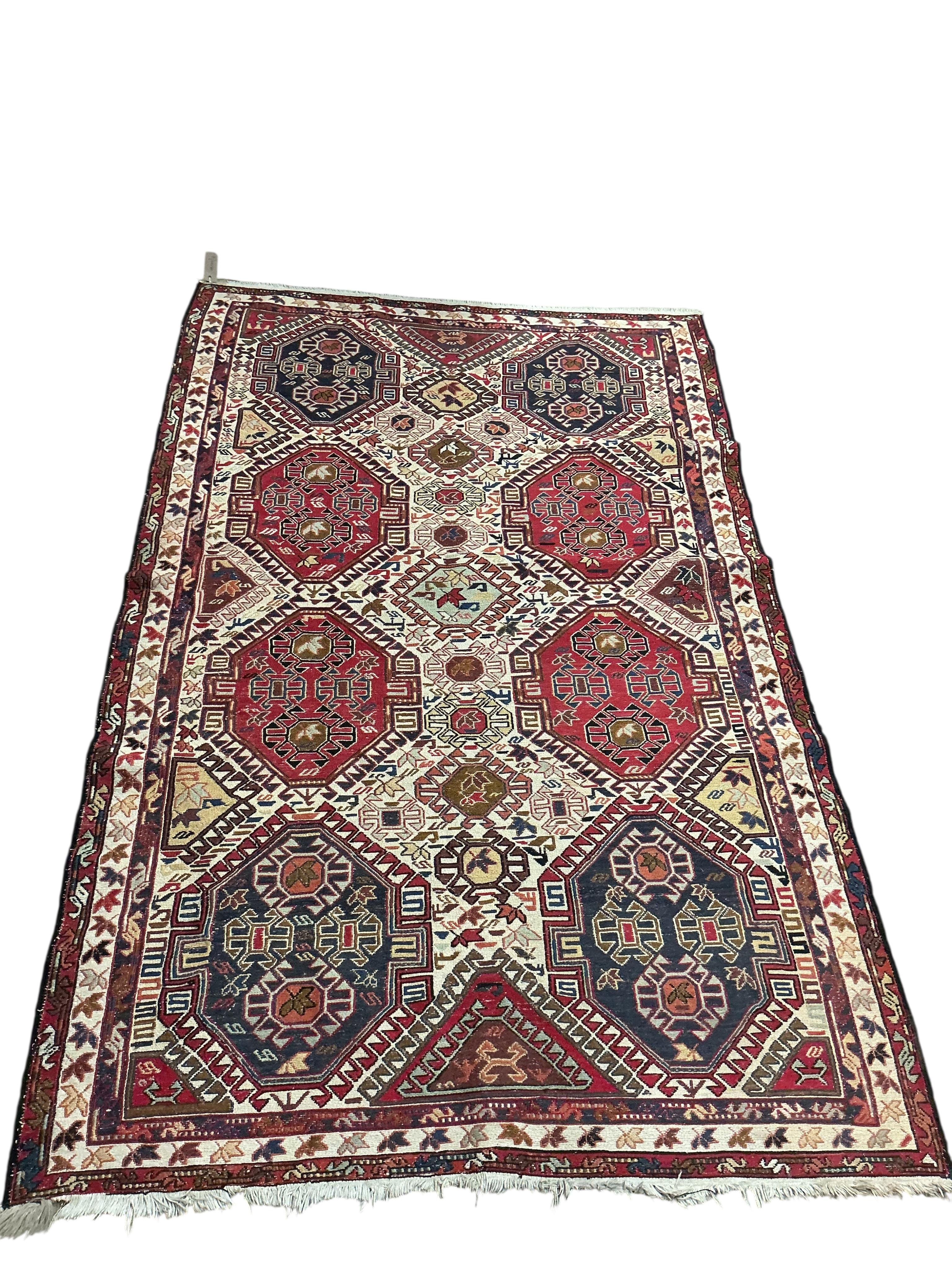 A Soumak blue ground rug, 200 x 120cm